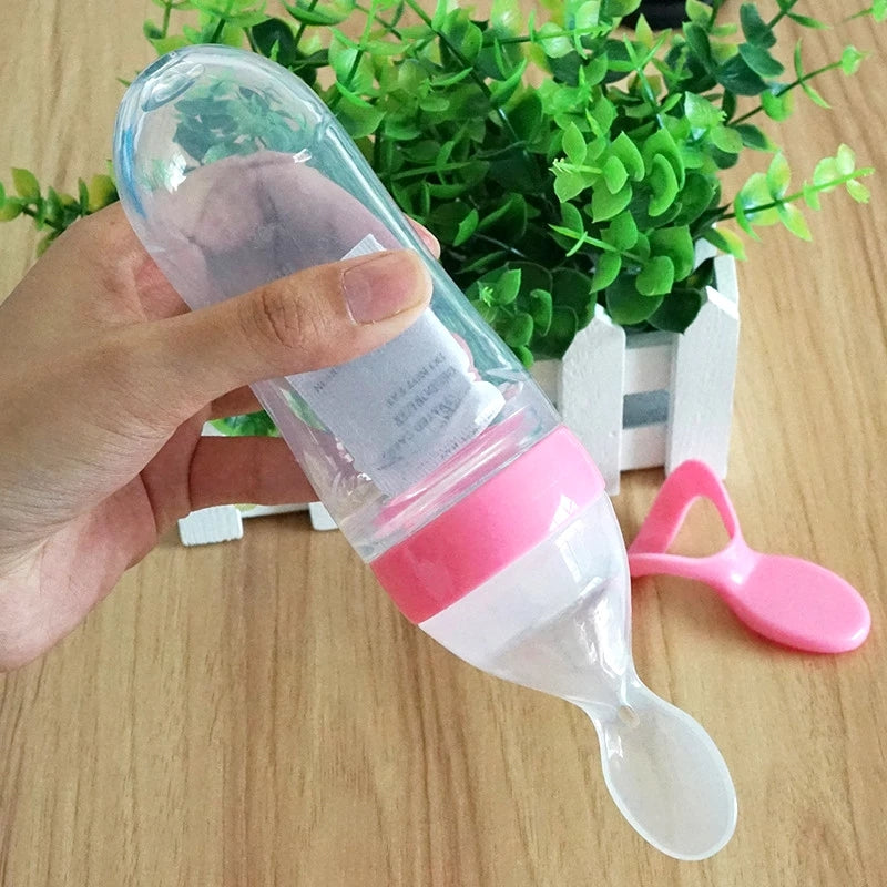 Baby Spoon Feeder Milk Bottle Silicone Squeeze Pacifier.
