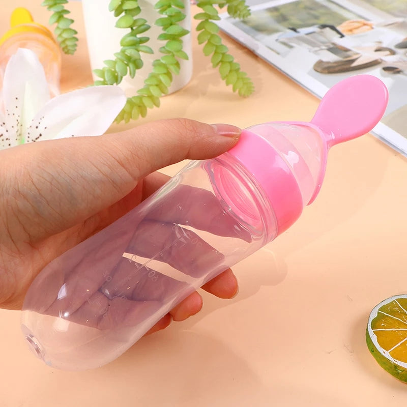 Baby Spoon Feeder Milk Bottle Silicone Squeeze Pacifier